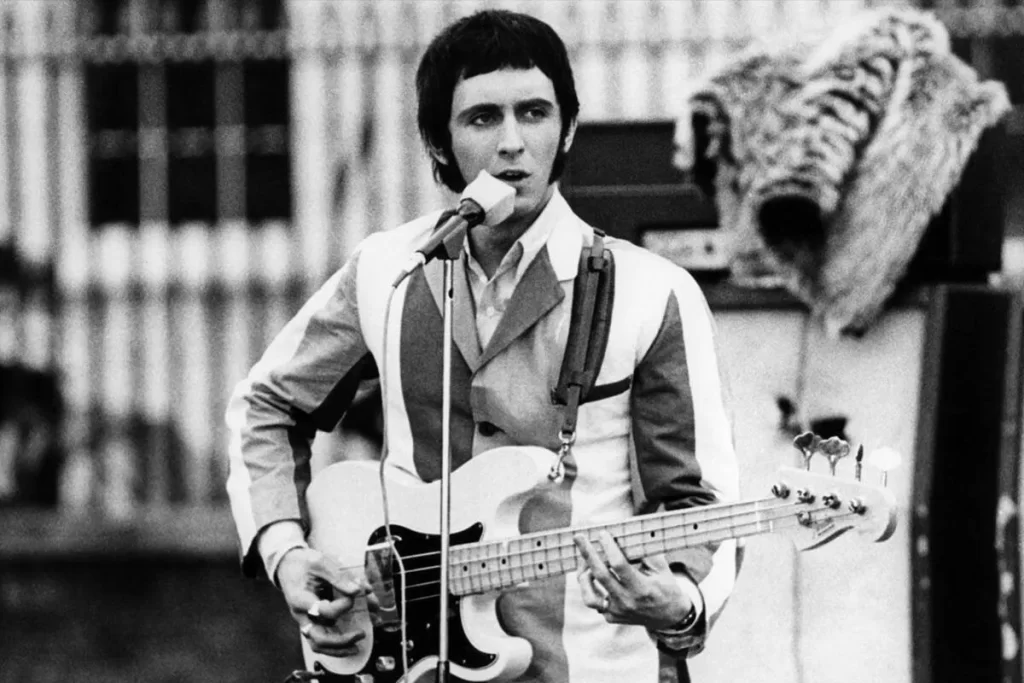Young John Entwistle playing in concert